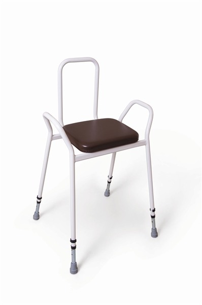 Perching stool with white frame and brown vinyl upholstery